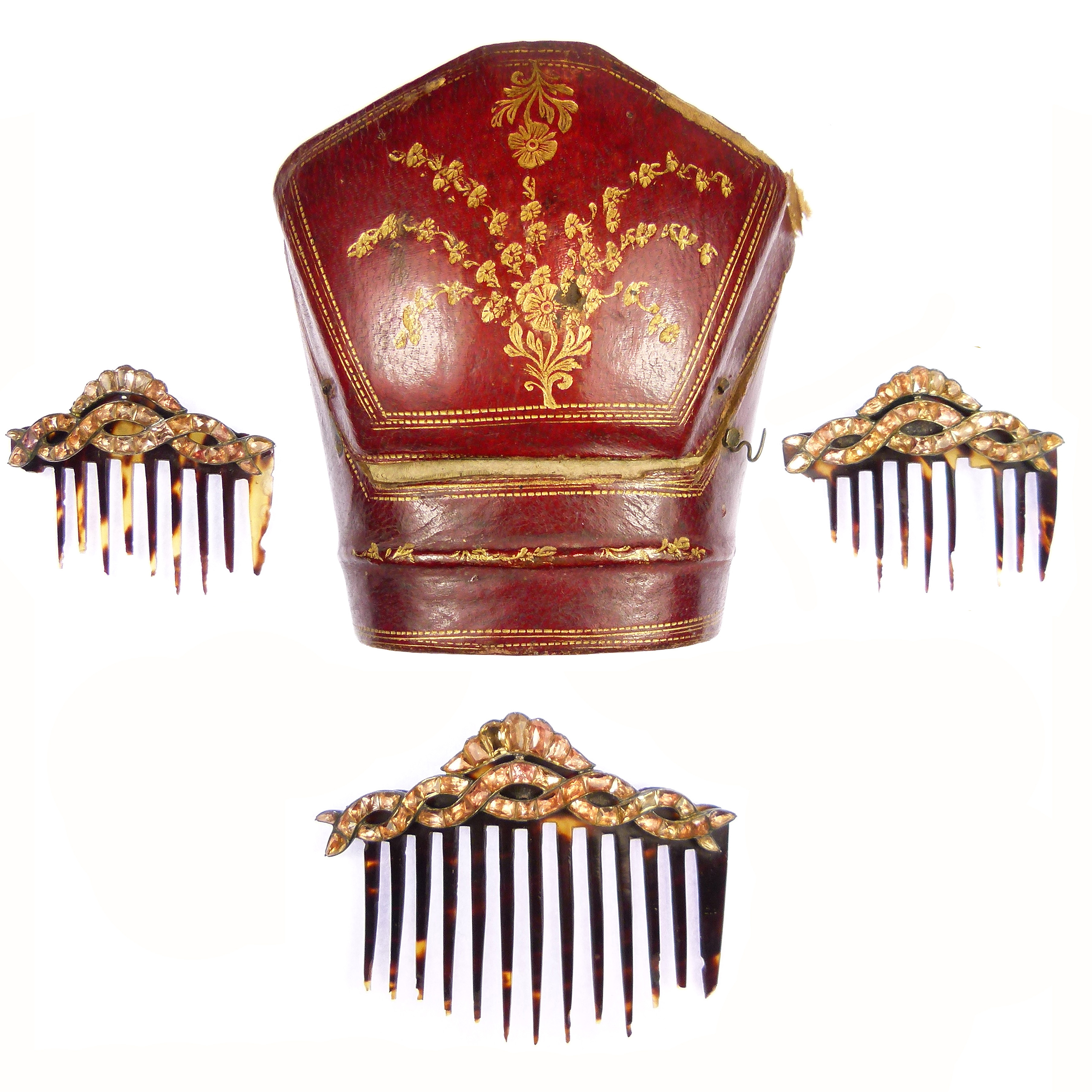 Set of three golden orange topaz graduated hair combs, one large and two small